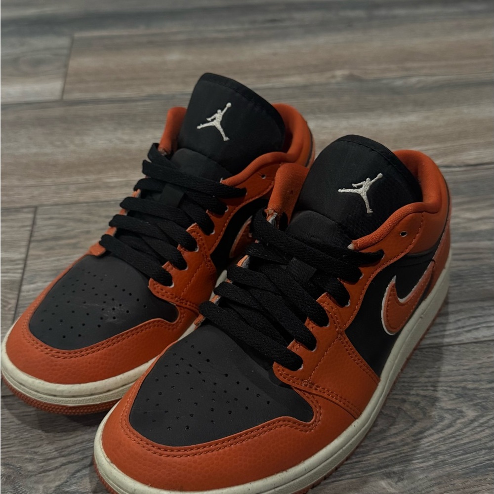 Nike Black and Orange Sneakers with Bold Design